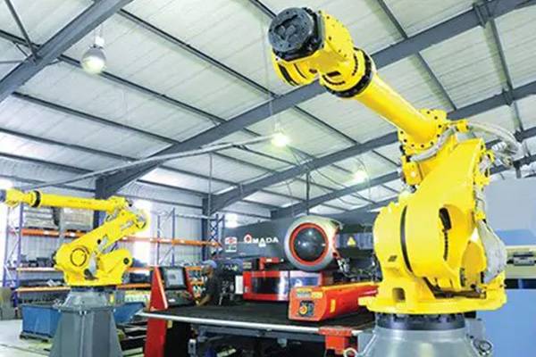 Robotic arms in Just Refrigeration workshop - About Us Page Image